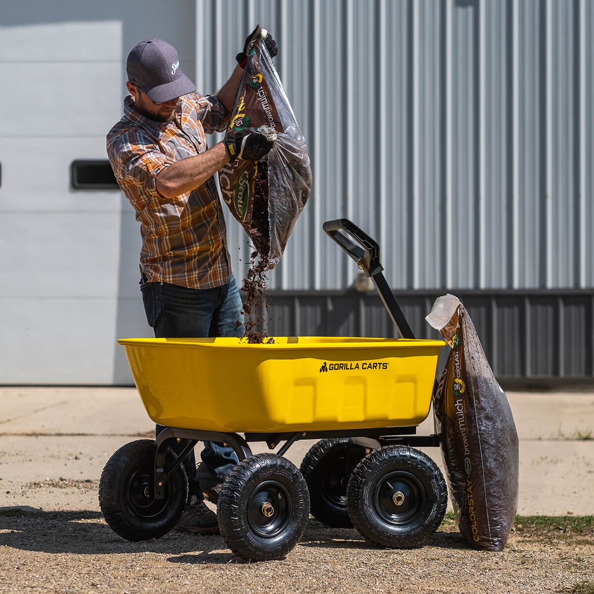 man dumping mulch in a GCSD-8